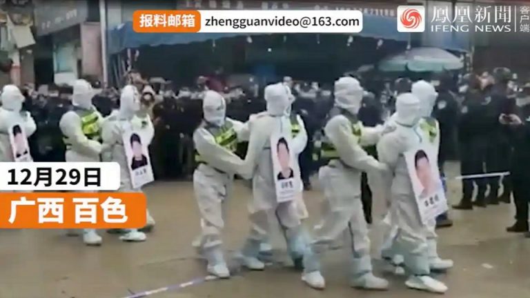 Chinese police parade suspected Covid rule-breakers through streets
