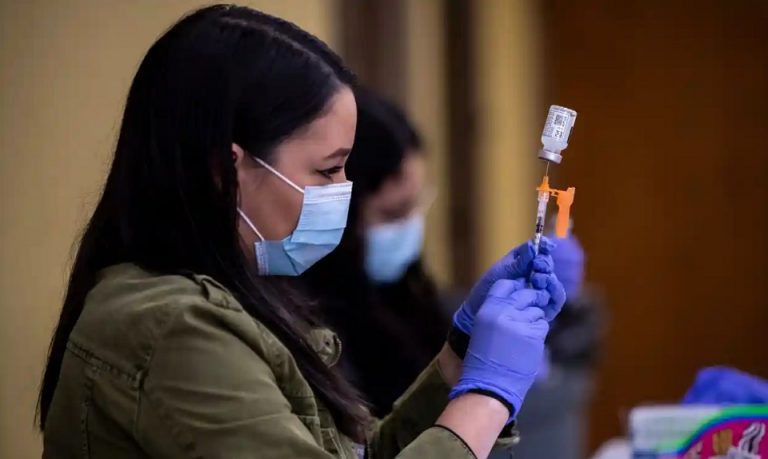 US Covid death toll over 900,000