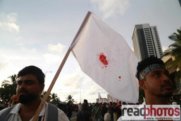 White flags raised in front of Temple Trees in remembrance of Rambukkana shooting victim (VIDEO)