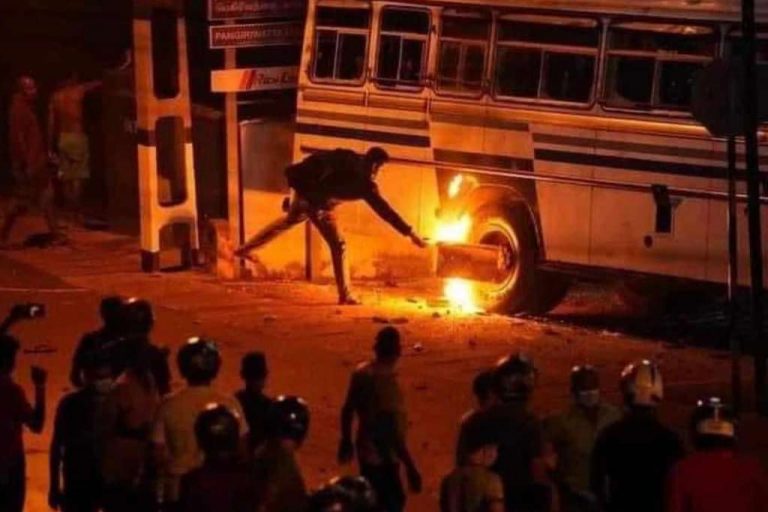 Police ask public to find man who set bus on fire during unrest