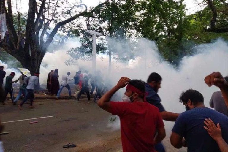 Protest in Peradeniya. Police launch tear gas and water attack