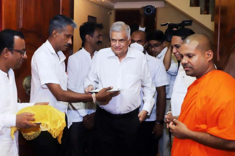 Johnny’s buddy seen with Ranil at Gangarama..?