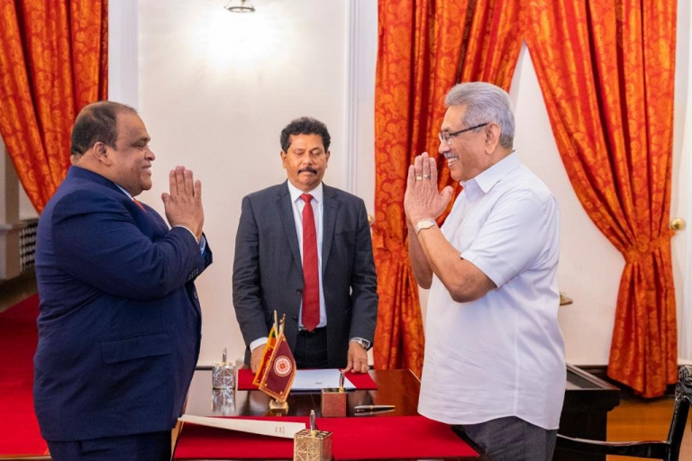 Dhammika Perera sworn in as Minister (Photo)