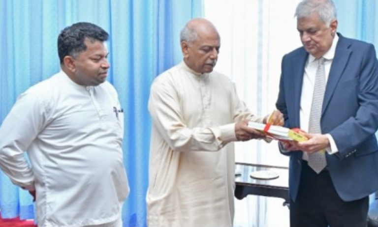 President presented with Sinhala and Tamil Font books on International Mother Language Day