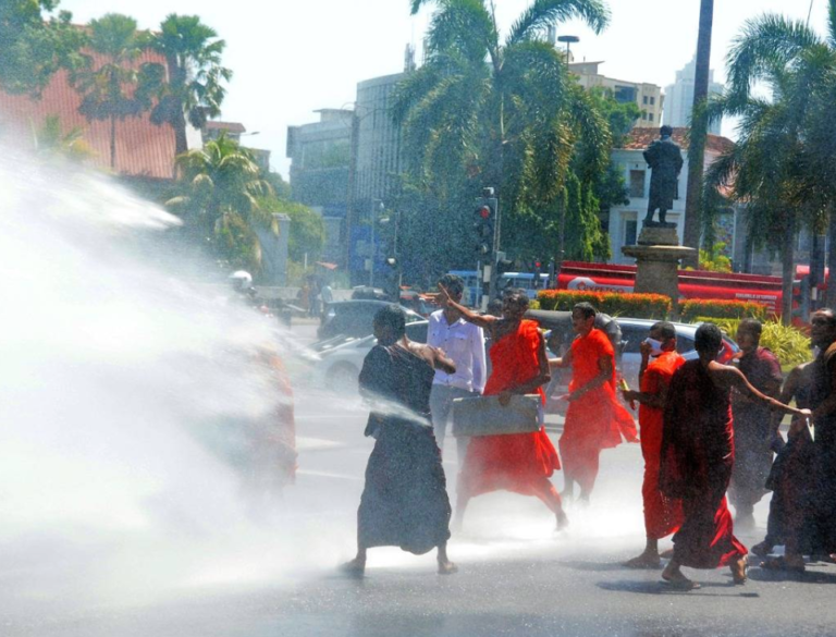 Inter-University Bhikkhus Board Protests Academic Enrollment Reduction; Police Disperse March with Water Cannon