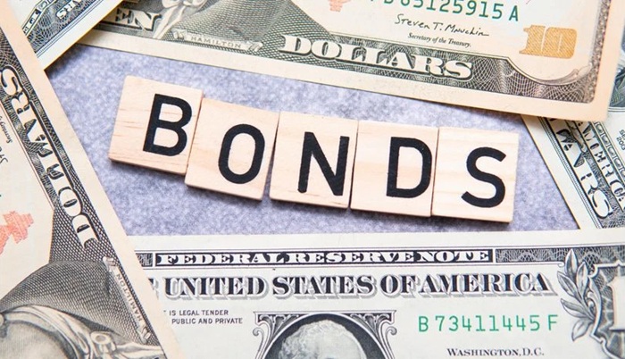 Dollar Bond Fund Gains, But Regulatory Questions Persist